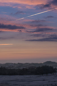 Scenic view of dramatic sky during sunset