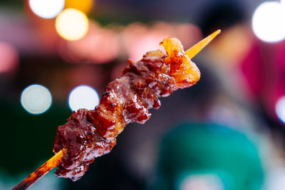 Close-up of meat on barbecue