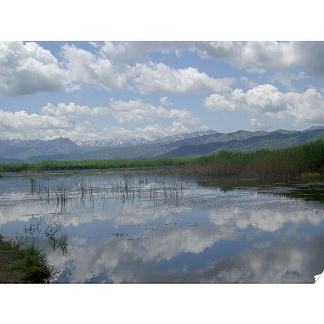 lake, tranquil scene, tranquility, water, scenics, sky, mountain, reflection, beauty in nature, mountain range, cloud - sky, nature, cloud, landscape, cloudy, idyllic, waterfront, non-urban scene, transfer print, auto post production filter