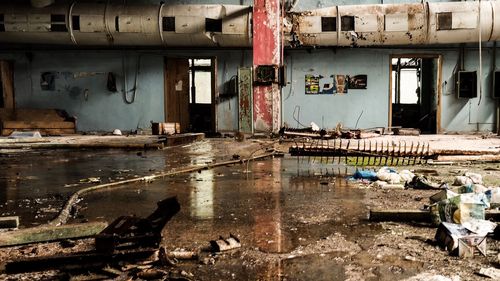 Abandoned building by water