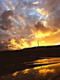 Scenic view of dramatic sky during sunset