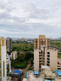 High angle view of buildings against sky