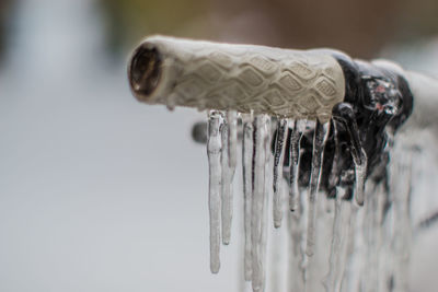 Close-up of frozen handlebar