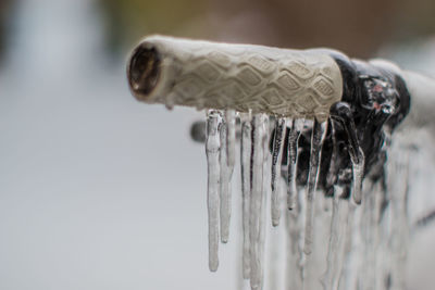 Close-up of icicle on handlebar