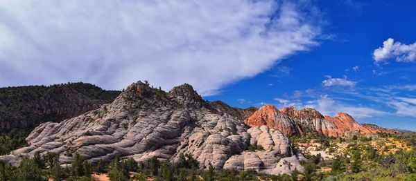 Panoramic view of rock formations against sky