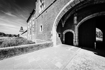 Entrance of historic building against sky