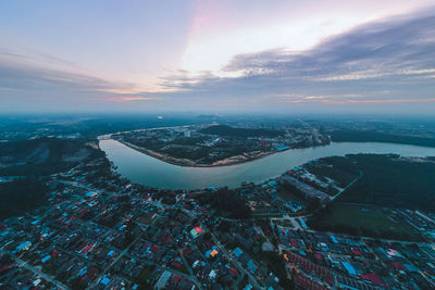 High angle view of buildings against sky during sunset