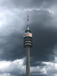 Low angle view of communications tower against sky