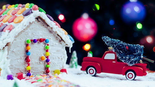 Close-up of christmas decorations on snow