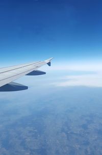 Bird flying over blue sky