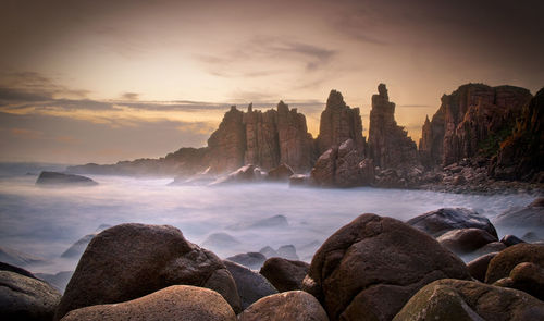 Scenic view of rock formations during sunset