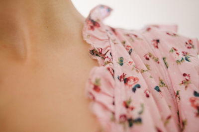 Cropped image of woman wearing patterned top