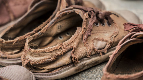 Close-up of weathered shoes