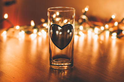 Close-up of wine glass on table
