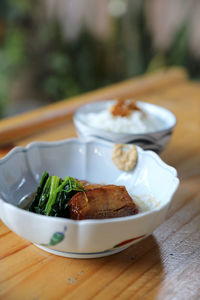 Close-up of food served on table