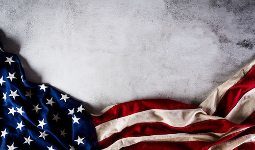 Close-up of flag on bed