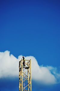 Low angle view of built structure against blue sky