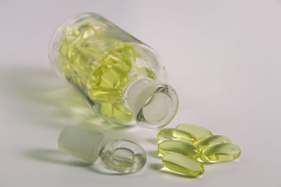 Close-up of green bottles on table