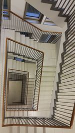 Low angle view of spiral staircase in building