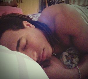 Woman sleeping on bed