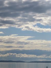 Low angle view of clouds over sea