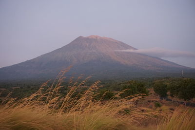 View of volcanic landscape against sky