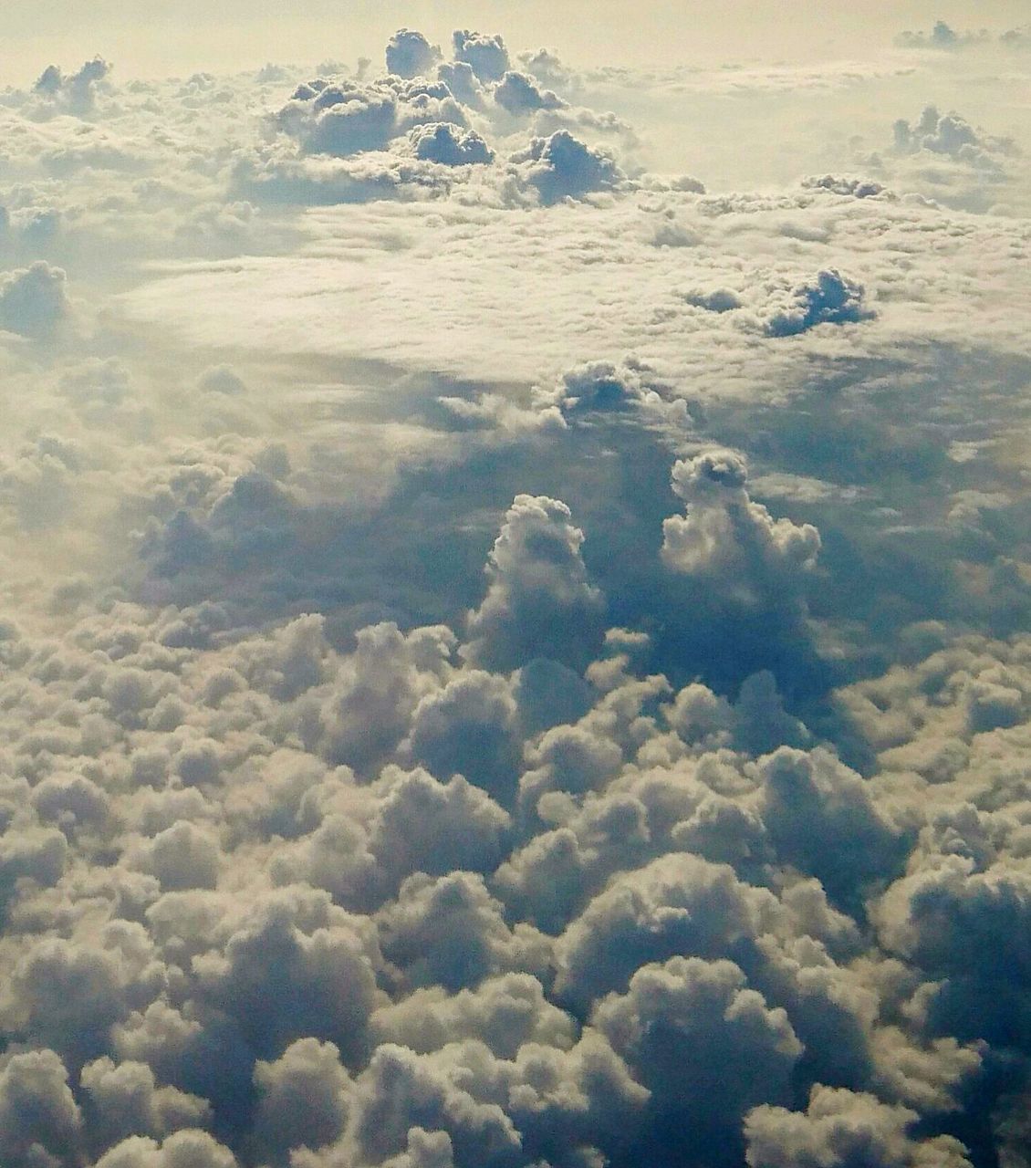 AERIAL VIEW OF CLOUDS OVER SEA