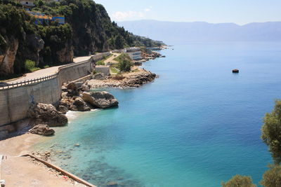 High angle view of bay against sky