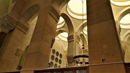 Low angle view of illuminated ceiling of building