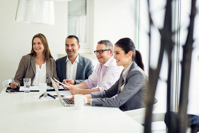 Group of people working on table