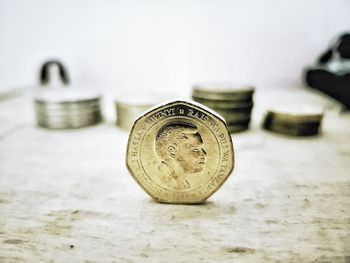 Close-up of coins on table