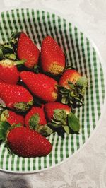 High angle view of strawberries on table