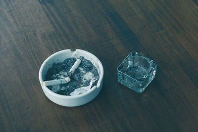 High angle view of ashtray on table