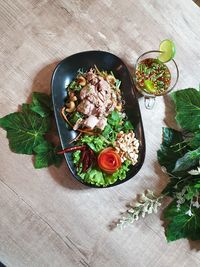 High angle view of salad in bowl on table