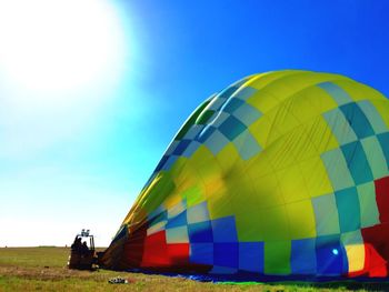 Hot air balloon in field