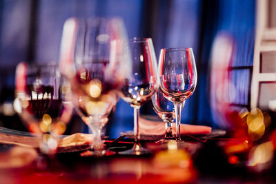 Luxury table settings for fine dining with and glassware, beautiful blurred background. 