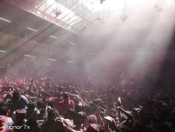 Group of people enjoying at music concert