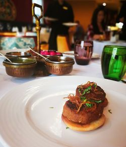 Close-up of food served on table