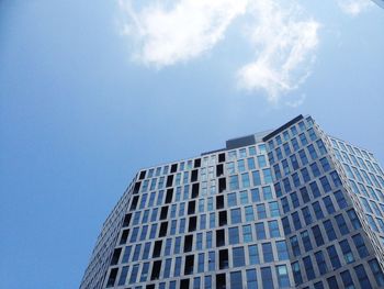 Low angle view of modern building against sky