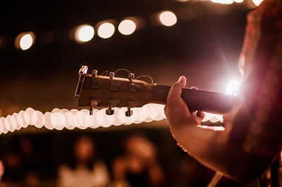 Man playing at music concert