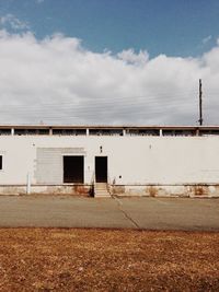 Built structure against cloudy sky