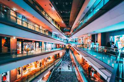 Low angle view of illuminated shopping mall