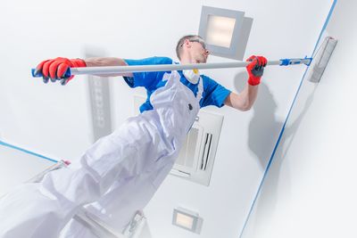 Low angle view of man working at home