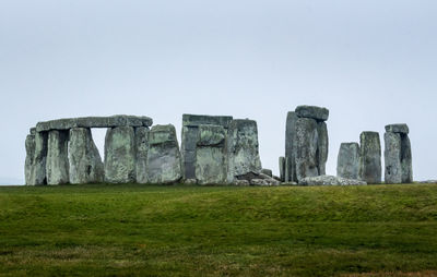 Built structure on field against clear sky