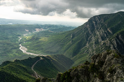 High angle view of valley against sky
