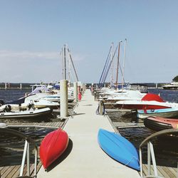 Boats moored at harbor