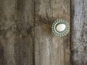 Directly above view of egg in glass bowl on table