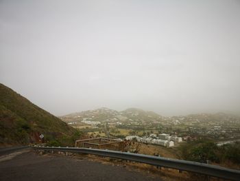 High angle view of bridge in city against sky