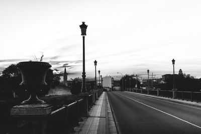 Road in city against sky