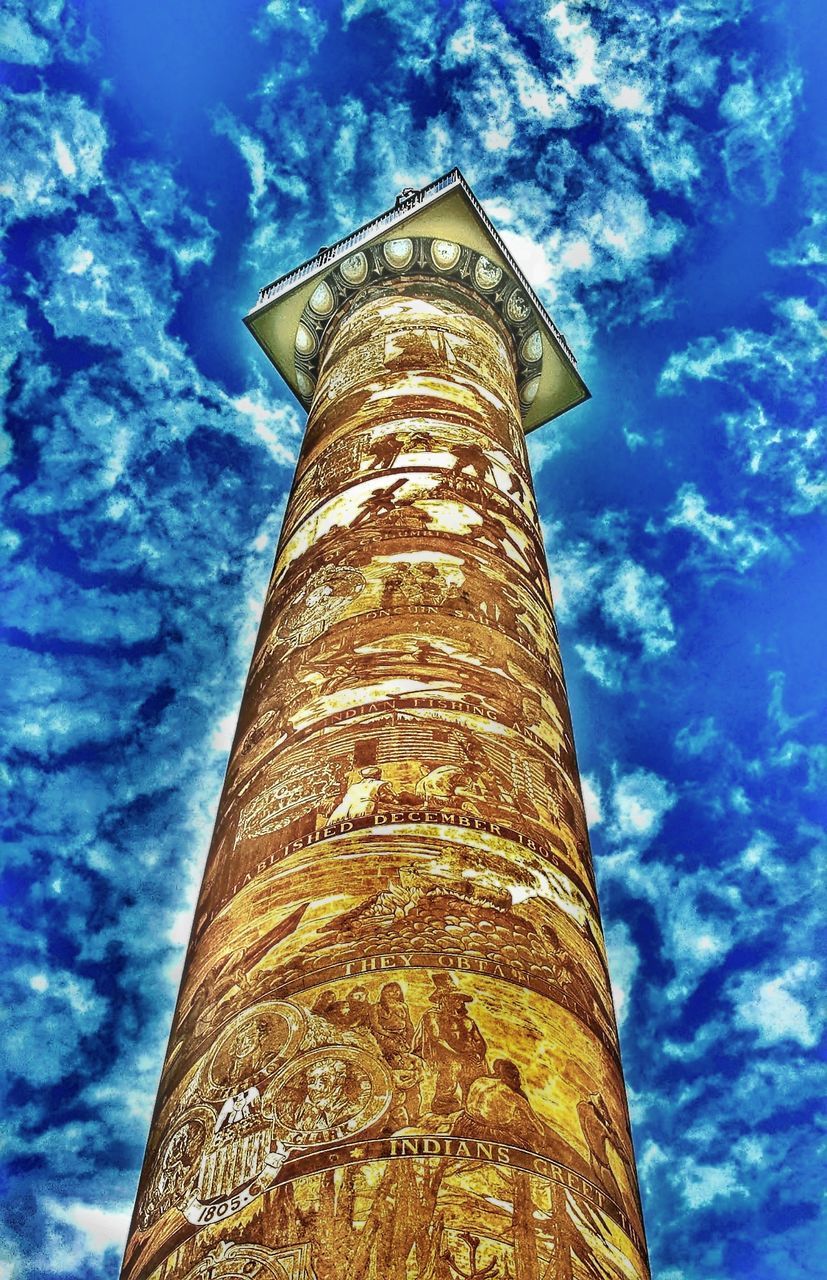 low angle view, sky, architecture, tall - high, cloud - sky, tower, built structure, nature, no people, building exterior, day, blue, sunlight, outdoors, travel destinations, tree, history, old, building, the past, architectural column